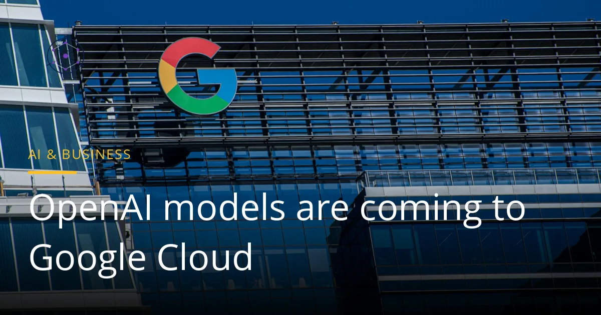 Google logo on the glass front of a Google office building against a blue sky